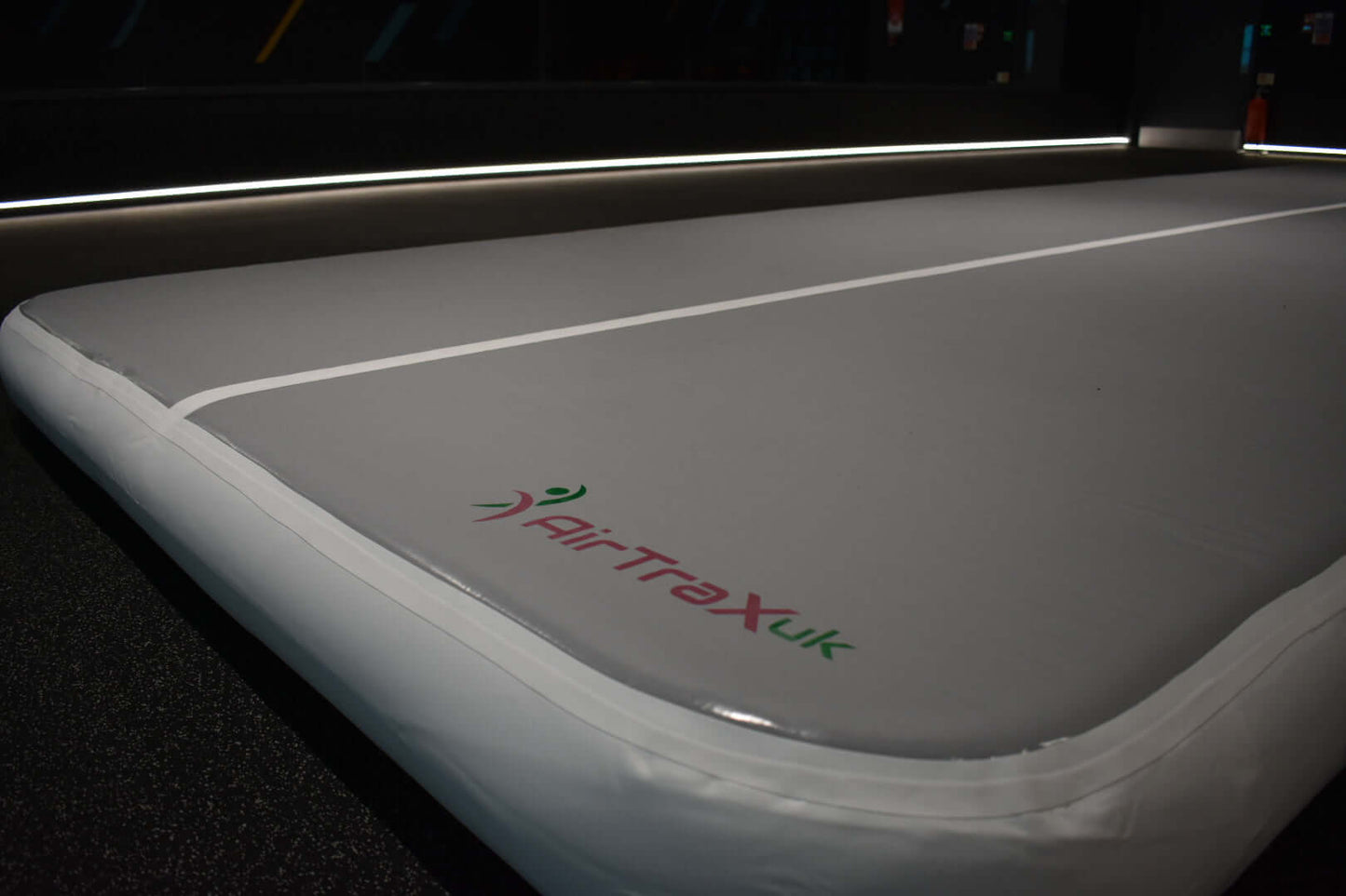 AirTraX Pro air track mat featuring durable construction and logo, designed for high performance and flexibility.